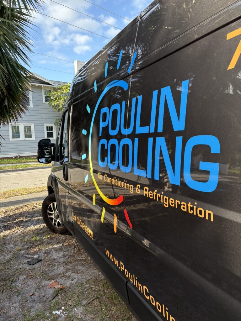Poulin Cooling service van with logo for air conditioning and refrigeration solutions.