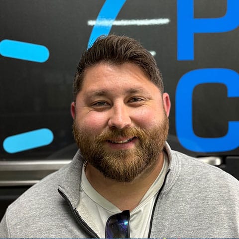Friendly team member at Poulin Cooling, expert in cooling solutions.